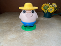 Pig Farmer Surprise Coin Bank